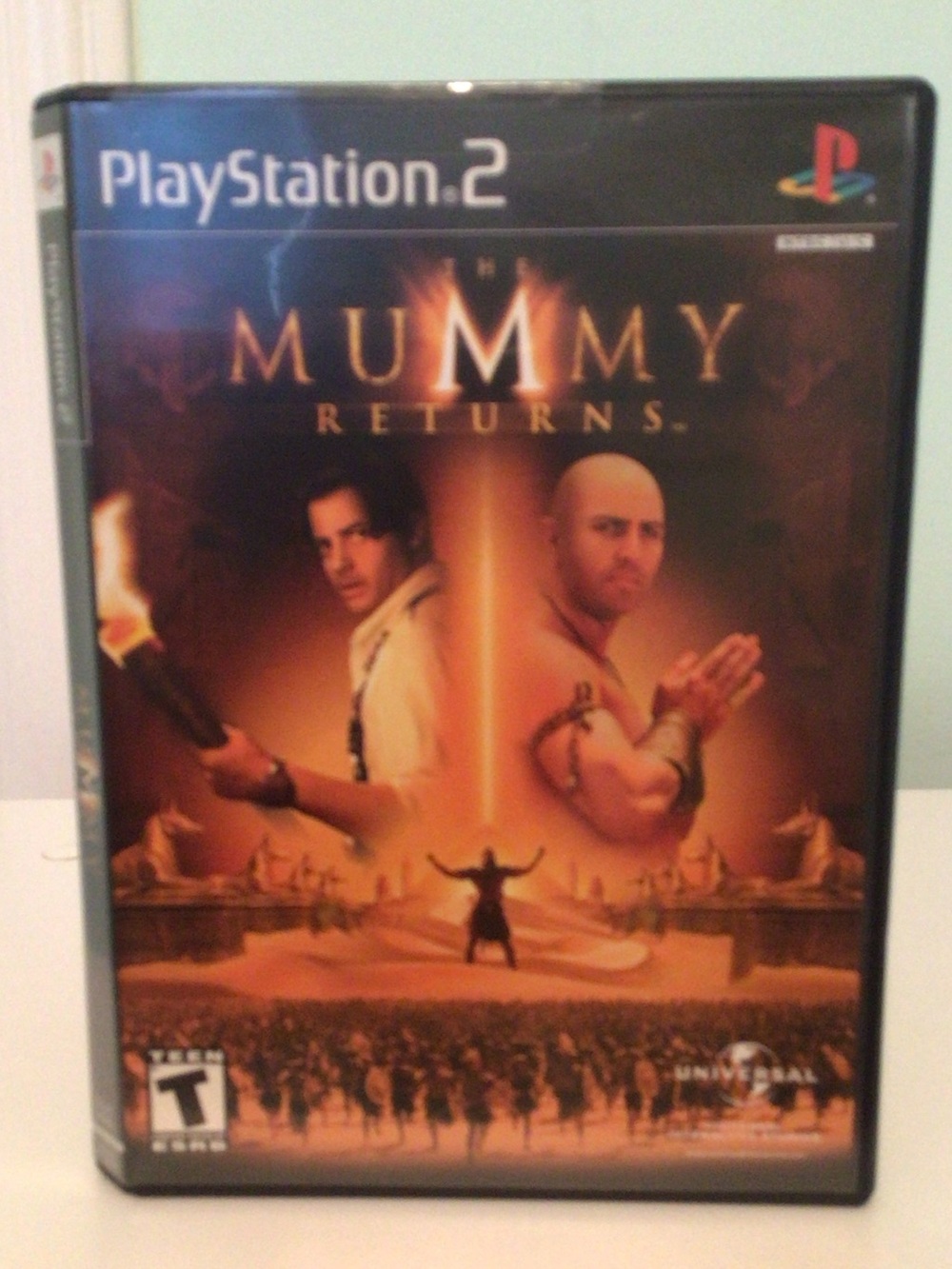 Sony PlayStation 2 The Mummy Returns (orange, black)